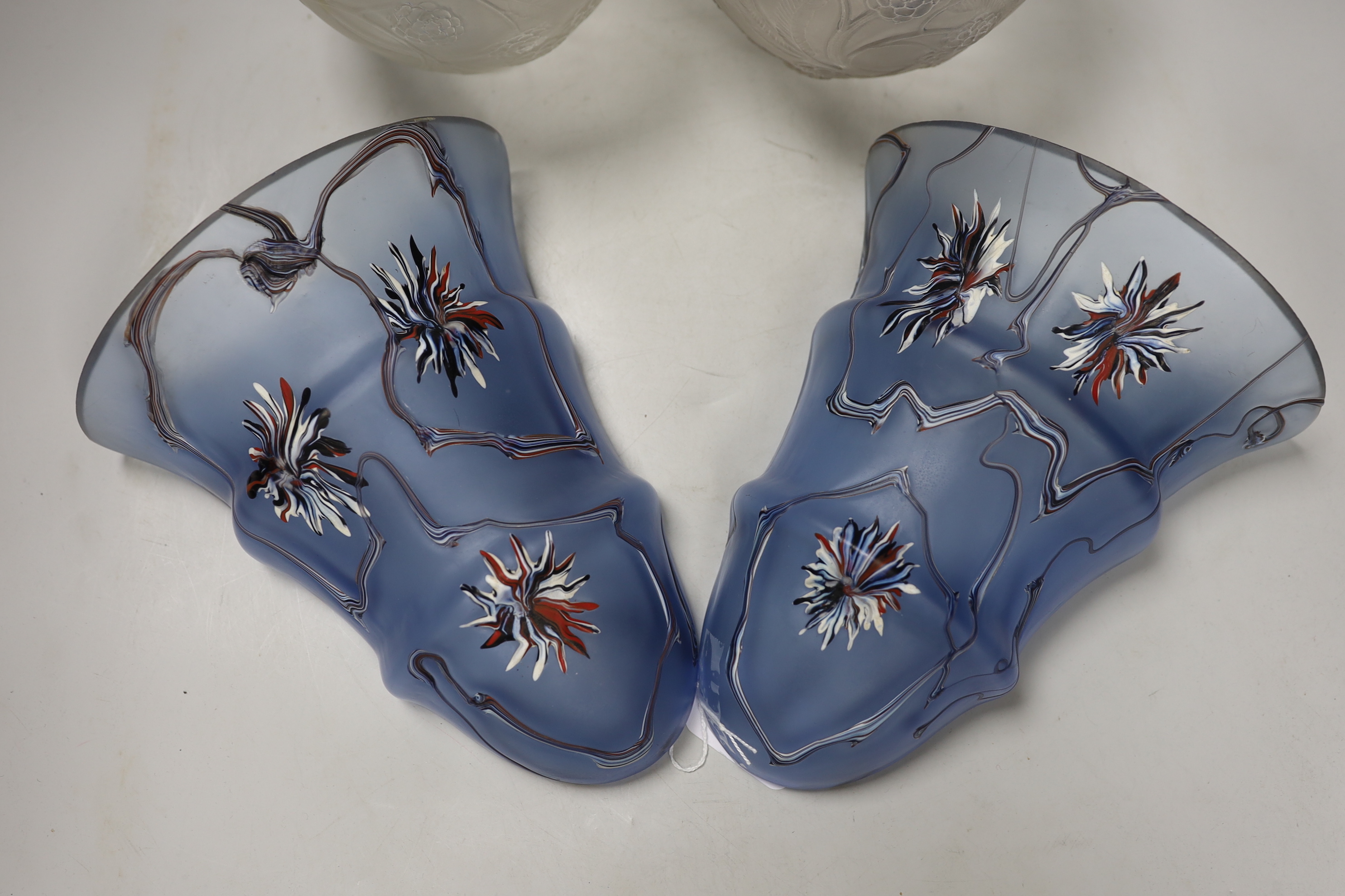 Two R. Lalique Nefliers vases, 14cm high, and a pair of blue enamelled glass wall pockets